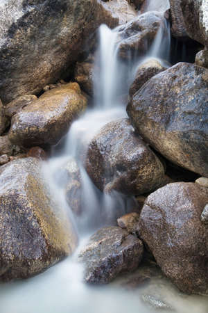 Waterfall as a background. Beautiful natural composition