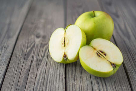 Fresh apple on old wood background. Healthy and tasty food