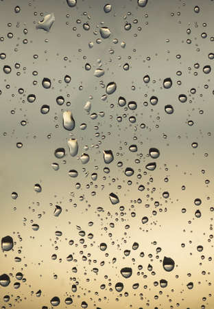 Water drop on the glass surface. Abstract background