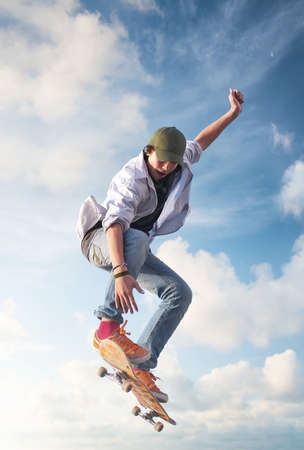 Skater on the sky background. Sport and active life conceptの写真素材