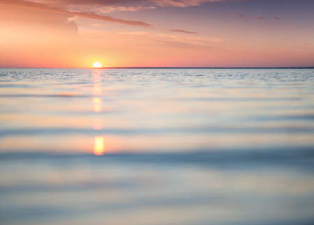 Seascape during sunrise. Beautiful natural summer seascapeの写真素材