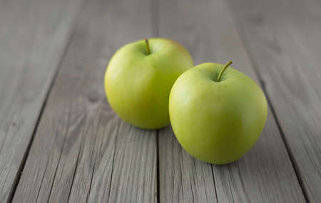 Fresh apple on old wood background. Healthy and tasty foodの写真素材