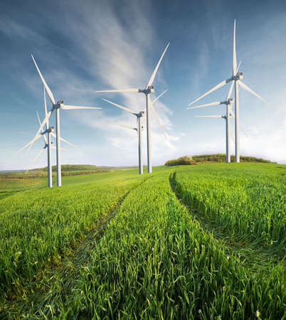 Wind power station on the field. Energy concept and idea