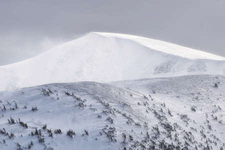Mountains in the winter time during sunset. Natural landscape in the winter time
