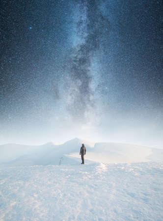 Tourist on the night sky background. Active life concept and ideaの写真素材