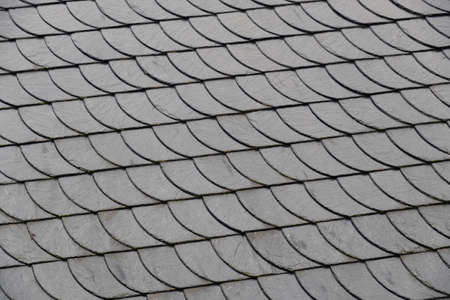 Shingles on the roof as a background. Concept and idea for buildingの写真素材