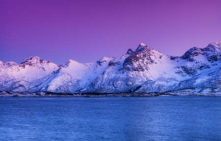 Mountain ridge and reflection in the lake. Natural landscape in the Norwayの写真素材