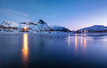 Mountain ridge and reflection in the lake. Natural landscape in the Norwayの写真素材