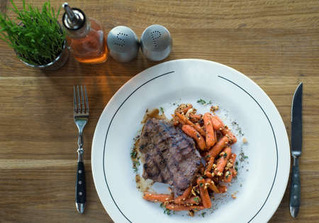 Steak and grill vegetables as a dinner background. Concept and idea of tasty foodの写真素材