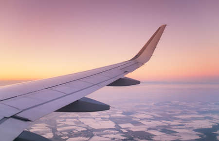 Aircraft wind on the sunrise sky background. Composition of aircraftの写真素材