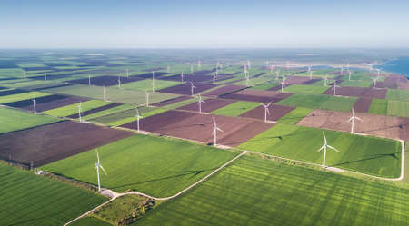 Wind power station on the field. Concept and idea of alternative energy development