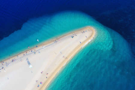 Croatia, Hvar island, Bol. Aerial view at the Zlatni Rat. Beach and sea from air. Famous place in Croatia. Summer seascape from drone. Travel - imageの写真素材