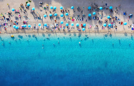 Aerial view on the beach. Top view from drone at beach and azure sea.