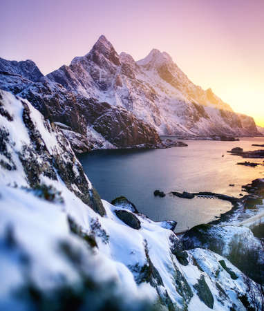 Lofoten island landscape, Norway. Mountain peak and ocean bay during sunrise. Natural landscape in the Norway. Travel - imageの写真素材