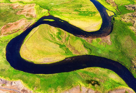 Iceland. Aerial view on the field and river. Landscape in the Iceland at the day time. Landscape...