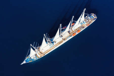 Aerial view at the cruise ship with sail. Adventure and travel.  Landscape with cruise liner on...