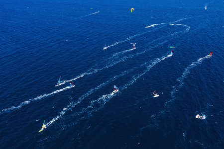Aerial view on the windsurfers. Sea from air. Famous place in Croatia. Summer seascape from drone....