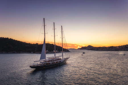 Aerial view on cruise ship during sunset. Adventure and travel. Landscape with cruise liner on Mediterranean sea. Luxury cruise. Travel and vacation imageの写真素材
