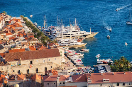 Hvar island, Croatia. Marina. View of the town from the castle. Landscape in summer time. Bay with...
