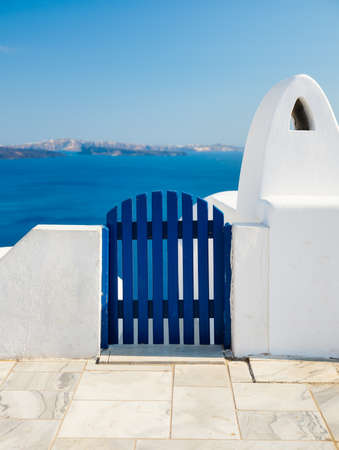 Traditional courtyard entrance in the village of Oia, Santorini, Greece. Traditional architecture. Photo as wallpaper.の写真素材