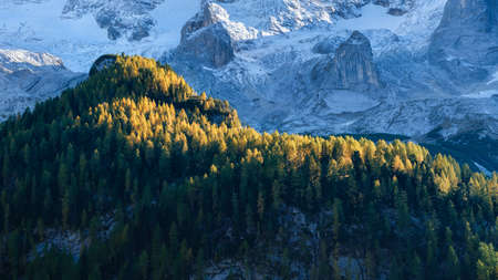 High sharp rocks and forest. Mountain valley before sunset. Natural landscape. Landscape in autumn time. Photo in high resolution.の写真素材