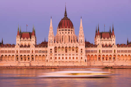 Budapest, Hungary. A classic view of the historic parliament building. Danube River and Parliament during sunset. A ferry trip on the Danube Riverの写真素材