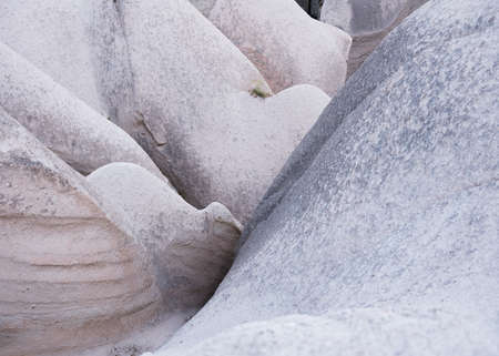 Rocks as a background. Smooth lines of rocks as a design image. Natural abstraction.の写真素材