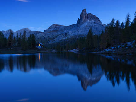 High mountains and reflection on the surface of the lake. Lago Federa, Dolomite Alps, Italy. Landscape at the night. Photo in high resolution.の写真素材