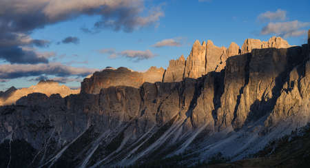 Panoramic view of the mountain peaks during sunset. The Dolomite Alps, Italy. Natural scenery in the highlands. Large resolution photo.の写真素材