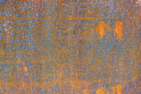 Rust on metal as a background. Corrosion on metal parts. Abstract composition for the design. Bright red rust.の写真素材