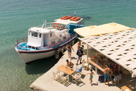 Paros, Greece, 10 August 2015. Arrival of  a boat with passengers at famous Arodo beach in Paros.のeditorial素材