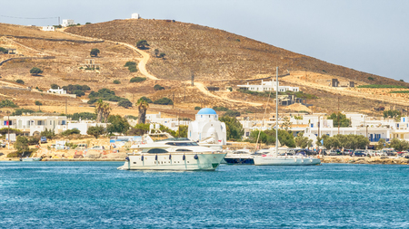Antiparos port in Greece with a traditional white church standing in the middle.のeditorial素材