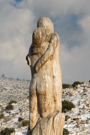 Athens, Greece 02 January 2016. The hope couple wood carving at the park of lost souls Parko Psychon at Parnitha mountain.のeditorial素材