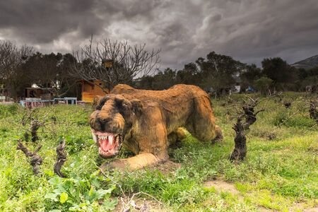 Athens, Greece 17 January 2016. Prehistoric animal sabertooth portrait at the dinosaur park in Greece.のeditorial素材