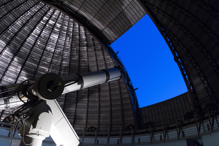 Athens, Greece 5 November 2016. Observing the night sky with a big telescope at Penteli observatory.