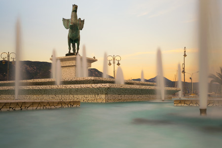 Corinth, Greece, 5 October 2017. Corinth in Greece central square with pegasus statue and the fountain.のeditorial素材