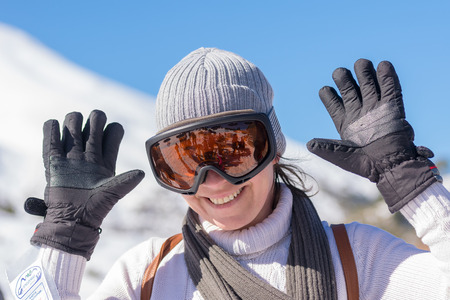 Portrait of a happy middle aged woman after skiing.の写真素材