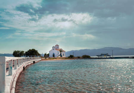 Saint Spyridon church at Elafonisos island. Landscape view against the sea.の写真素材