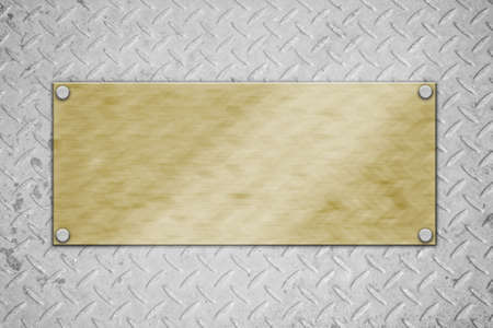 golden metal plate on concrete wall 