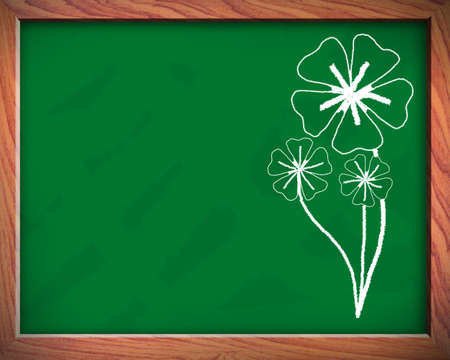 Flowers on the blackboard use in the background  の写真素材