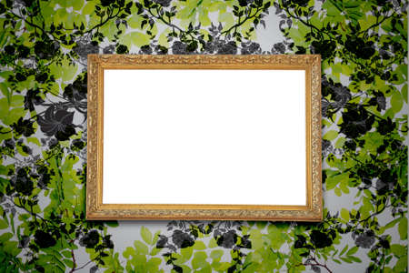 grunge floral faded wallpaper with golden vintage empty frame の写真素材