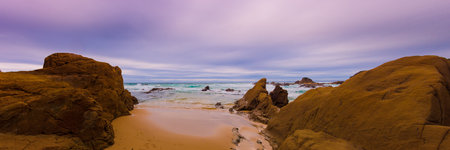 Red rock cousins  beach land scape photo. all photo . Mystery Bay is a small town on the south coast of New South Wales, Australia.の写真素材
