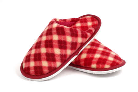 Cozy and warm tartan slippers on a white background.の写真素材