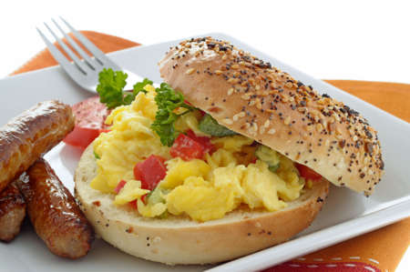 Sandwich made with egg on a fresh bagel.の写真素材