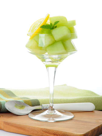 Fresh ripe honey dew melon with lemon.の写真素材