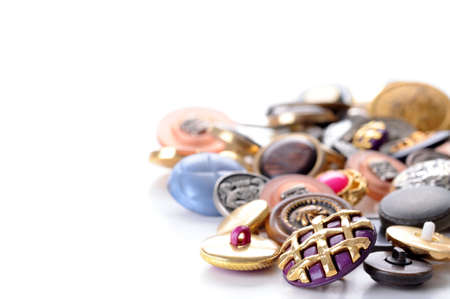 Collection of colorful buttons on a white background.の写真素材