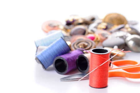 Closeup of needle and thread with very shallow depth of field.