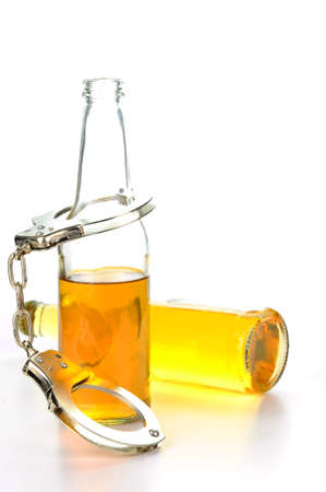 Concept photo showing the relationship of alcohol and crime.の写真素材