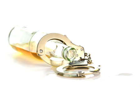 Concept photo showing relationship between alcohol and crime.の写真素材
