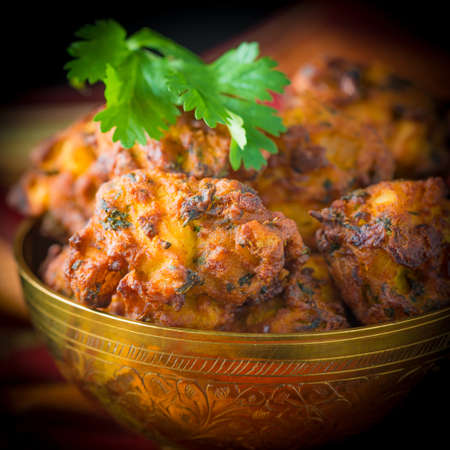 Pekoras are fried vegetable fritters originating in India.の写真素材